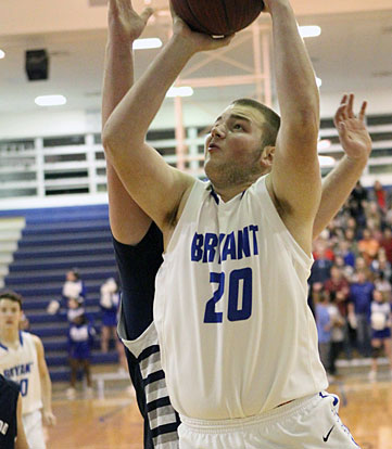 Dagin Carden (20) gets inside the defense. (Photo by Rick Nation)