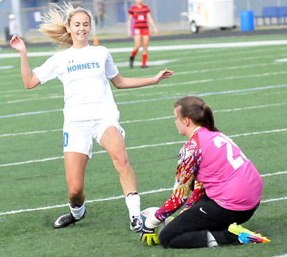 Anna Lowery confronts the Cabot keeper. (Photo by Kevin Nagle)