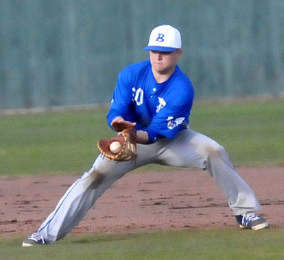 Garrett Misenheimer fields a ball at first. (Photo by Kevin Nagle)