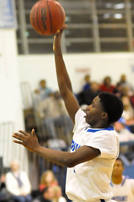 Calvin Allen releases a floater from the lane. (Photo by Kevin Nagle)