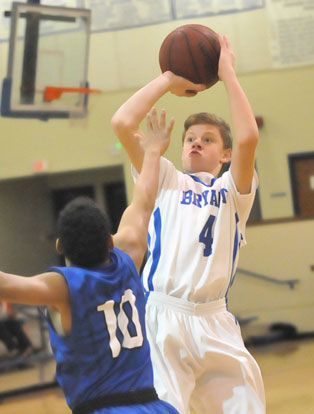 Sam Chumley shoots over Conway's Brandon Stone. (Photo by Kevin Nagle)