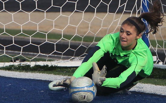 Maddie Hawkins saves a PK during Monday's shootout. (Photo by Rick Nation)