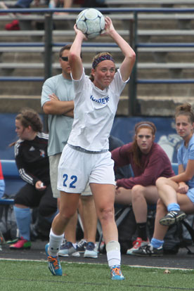 Britney Sahlmann makes a throw-in during Friday's State Tournament match with Fort Smith Southside. (Photo by Rick Nation)