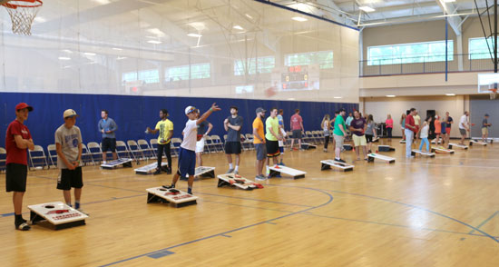 Teams warm up prior to Sunday's Baggo competition. (Photo by Rick Nation)