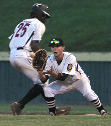 Benton's Ben Madison gets back into first safely on a pickoff throw to Bryant first sacker Jason Hastings. (Photo by Rick Nation)