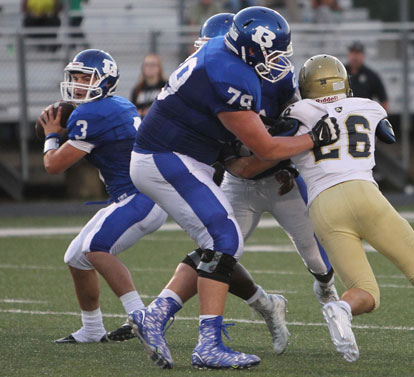 Gunnar Burks (3) looks downfield as Cole Fritschen (79) fends off Pulaski Academy rusher Jacob Anderson (26). (Photo by Rick Nation)