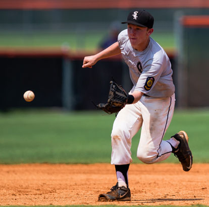 Dylan Hurt charges a grounder hit to short during Thursday's game. (Photo by Brian Davidson)