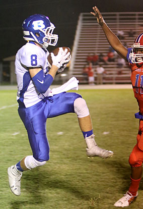 Aaron Orender (8) hauls in one of his seven receptions. (Photo by Rick Nation)