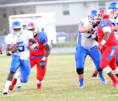 DeAmonte Terry (5) takes advantage of a block by Cole Fritschen (79). (Photo by Kevin Nagle)