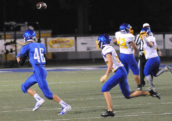 Micah Van Roekel (46) tracks a pass into the flat. (Photo by Kevin Nagle)