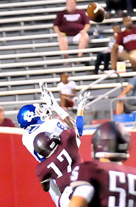 Aaron Orender prepares to haul in a pass that broke for a 65-yard touchdown. (Photo by Kevin Nagle)