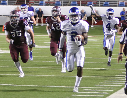 Sevante Turner (2) heads up the sideline on his 56-yard touchdown run as teammates Quentin Royal (4) and Cole Chapman (58) trail the play. (Photo by Rick Nation)