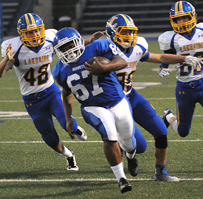 Kris King breaks free on the way to a 50-yard touchdown run. (Photo by Kevin Nagle)
