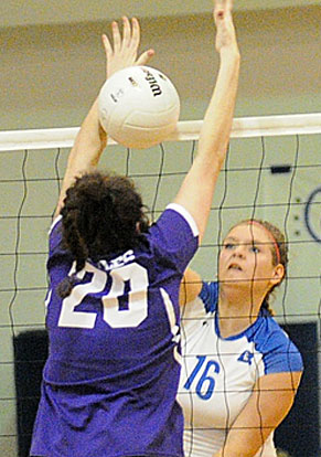 Brittney Warner gets a hit through the arms of a Mount St. Mary defender. (Photo by Kevin Nagle)