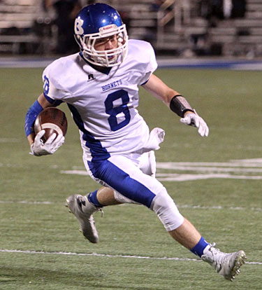 Hornets receiver Aaron Orender heads upfield after a catch. (Photo by Rick Nation)