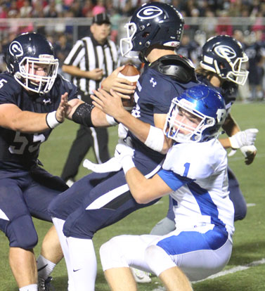 Bryant's Cameron Vail makes a tackle. (Photo by Rick Nation)
