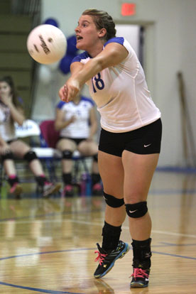 Kaci Squires receives a serve. (Photo by Rick Nation)