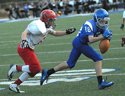 Ethan Loomis (18) caught two passes including one for a touchdown in Thursday's game but couldn't hand on to this one. (Photo by Kevin Nagle)