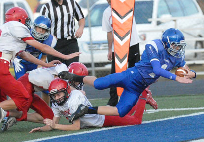 Bethel quarterback Jake Meaders (1) dives into the end zone on a run that was negated by penalty. (Photo by Kevin Nagle)