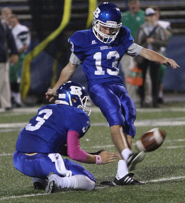 Hayden Ray (13) kicked a 21-yard field goal out of the hold of Gunnar Burks. (Photo by Rick Nation)