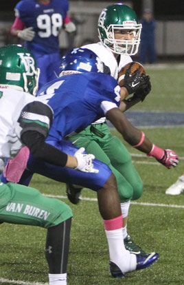 Bryant corner Quentin Royal (4) prepares to knock the ball away from Van Buren's Miles Malone. (Photo by Rick Nation)