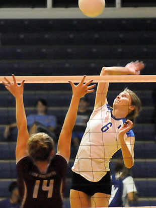 Allie Anderson goes up for one of her 24 kills. (Photo by Kevin Nagle)