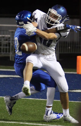 Josh Robinson breaks up a Conway White pass to Will McKenna (40). (Photo by Rick Nation)