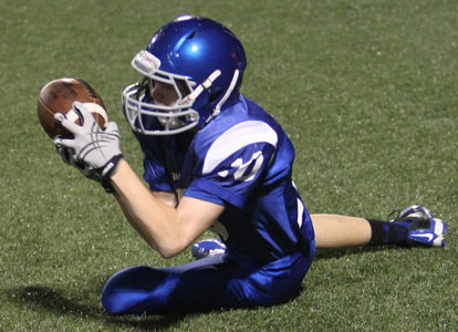 Hayden Linn latches onto a pass after slipping down at the 3-yard line. (Photo by Rick Nation)