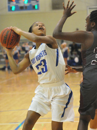 Allison Steen looks for room to shoot. (Photo by Kevin Nagle)