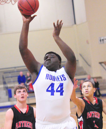 Kajuan Robinson (44) rises up for a shot. (Photo by Kevin Nagle)