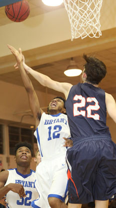 Bryant's Christian Macintosh (12) puts a shot up after grabbing an offensive rebound. (Photo by Rick Nation)