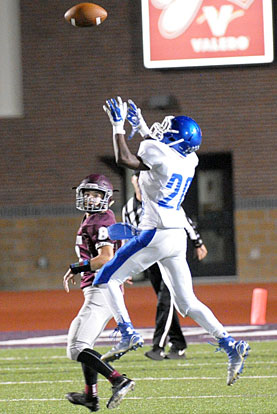 K.J. Terry goes high for an interception. (Photo by Kevin Nagle)
