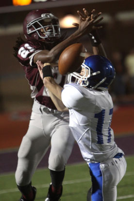 Tyler O'Neal (17) breaks up a pass to Benton's Zak Wallace (21). (Photo by Rick Nation)