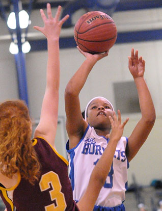 Selena Martin (13) led all scorers with 9 points in Monday's game. (Photo by Kevin Nagle)