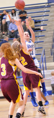 MaKaylah Kramer fires a shot over a Lake Hamilton defender. (Photo by Kevin Nagle)