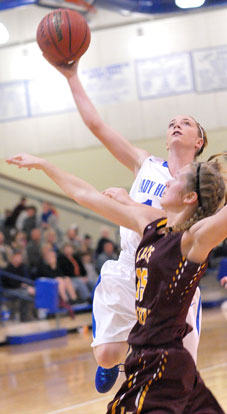 Meagan Chism goes up for a shot. (Photo by Kevin Nagle)