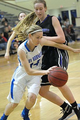 Meagan Chism (14) drives past a Mount St. Mary defender. (Photo by Kevin Nagle)