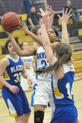 Destiny Martin (21) goes up for a shot inside. (Photo by Kevin Nagle)