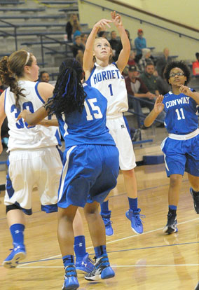 Camryn Ausbrooks (1) follows through on a jumper from the left wing. (Photo by Kevin Nagle)