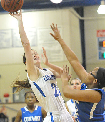 Mary Catherine Selig (21) tries to score over a Conway Blue defender. (Photo by Kevin Nagle)