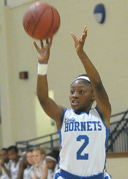 Tirana Robinson releases a shot from the left wing during Tuesday's game. (Photo by Kevin Nagle)