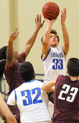 Alex Blair (33) launches a shot. (Photo by Kevin Nagle)