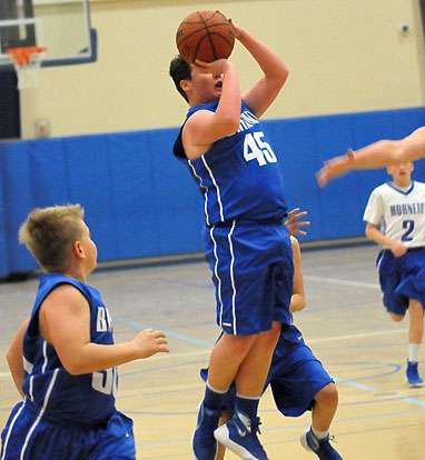 Bryant White's Chandler Stewart (45) sets to launch a shot. (Photo by Kevin Nagle)