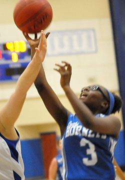 Sierra Trotter attempts a shot for Bryant White. (Photo by Kevin Nagle)