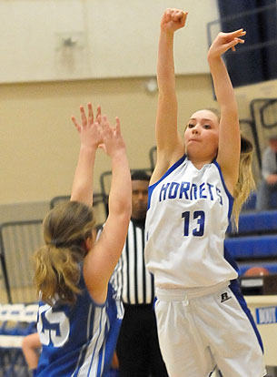 Bryant Blue's Casey Welch follows through on a jumper. (Photo by Kevin Nagle)