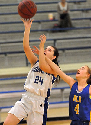 Natalie Harllee (24) goes up for a lay-in. (Photo by Kevin Nagle)