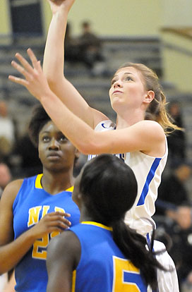 Meagan Chism goes up for a shot in traffic. (Photo by Kevin Nagle)