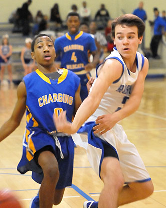 Bryant's Henry Terry whips a pass inside around a North Little Rock defender. (Photo by Kevin Nagle)