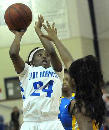 Kalia Walker goes up for a shot. (Photo by Kevin Nagle)