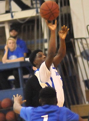 Calvin Allen launches a 3. (Photo by Kevin Nagle)